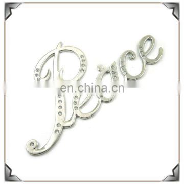 Hot sale zinc alloy with rhinestone word peace hanging metal ornaments nickle plated