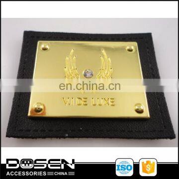 Shiny Gold metal base + rhinestone label private high quality leather label your own brand clothing for wholesale used clothing