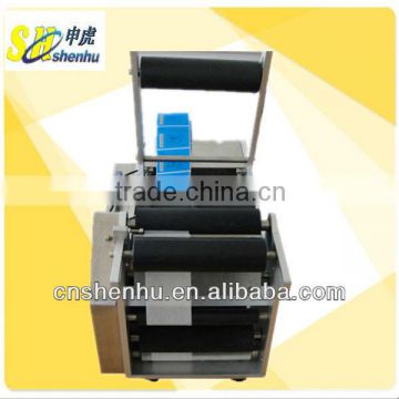 semi-automatic round bottle sticker labeling machine