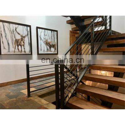 Central spine stair middle stringer staircases with wood tread