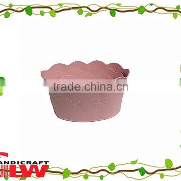 set of 3 handmade and durable flower shaped home storage buckets in pink color