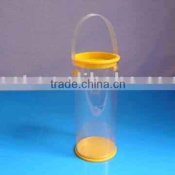 Injection molded clear plastic tube with diameter 5.7cm,sealed bottom and hanger caps