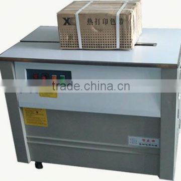 Automatic pallet strapping machine