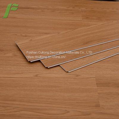 Wood grain waterproof floor glue hard block SPC floor glue-free stone plastic floor tile sheet buckle plastic floor