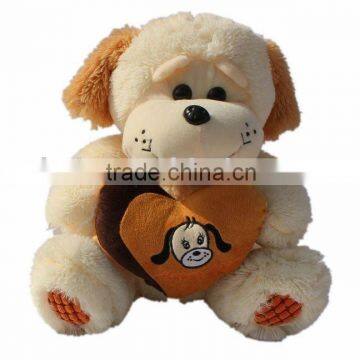 plush and stuffed dog toy with heart