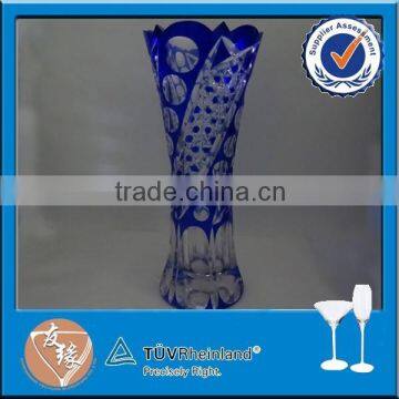 Elegant artificial flowers with glass vase in cheap