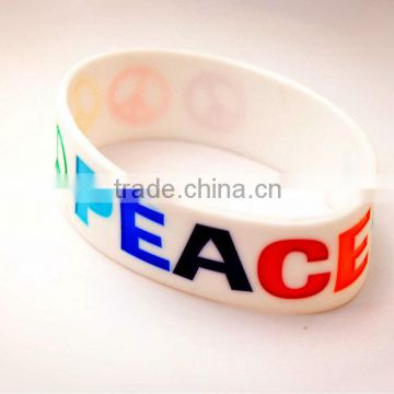 Wide silicone bangle with debossed logo