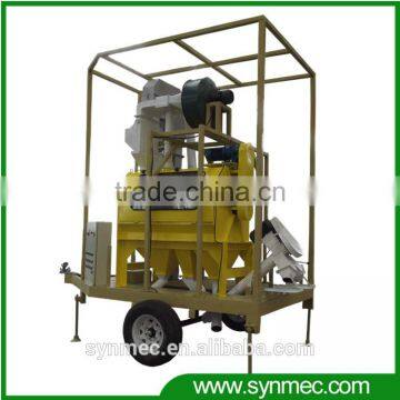 rotary seed cleaner with seed treating unit