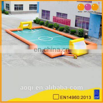 AOQI cheap price giant inflatable football pitch game for sale