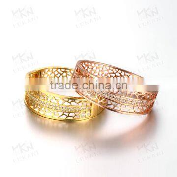 Hollow golden bangle with wholesale price for women 2015