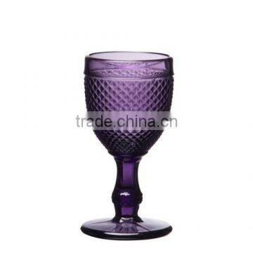 purple color glass cup with thick stem