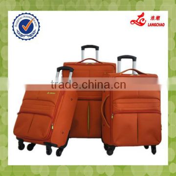 Orange Color Real Push Trolley 4 Wheels TSA Lock Alibaba China Wholesale Aluminum Trolley Cases