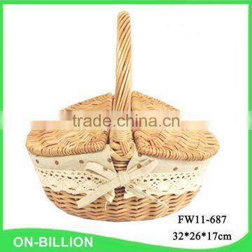 Woven wicker material food hamper with foldable lid