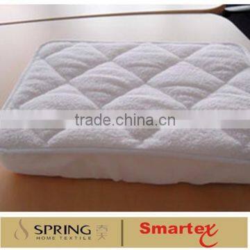 Quilted terry mattress protector for hospitality