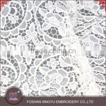 Chinese Manufacturer cutwork embroidery dress types of net lace fabric with meticulous care design