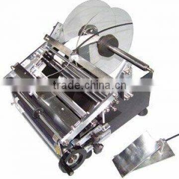 Mini round bottles labeling machine