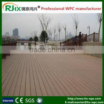 Plastic composite deck for outdoor garden walkway and square center places