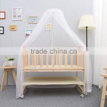 New baby bed solid wood multifunctional baby carriage change desk rocking bed to send mosquito net can be customized