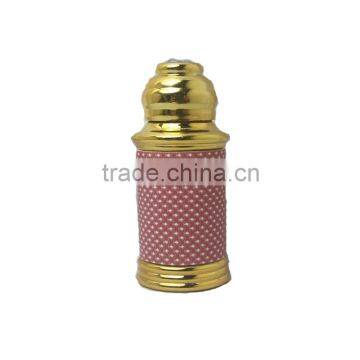 OEM latest novel 200ml empty glass bottle with golden plastic shell esential oil bottle
