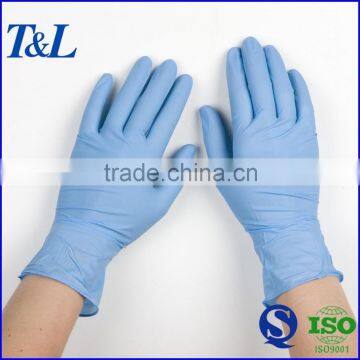 Disposable blue plastic vinyl glove with customized sizes and powder free