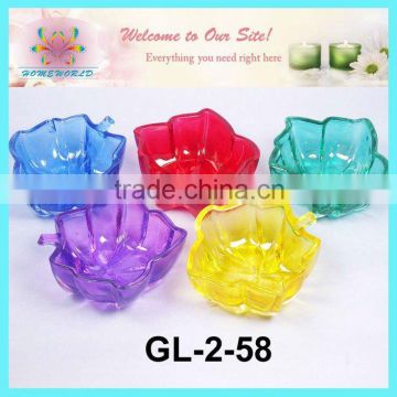 colored glass candle holder in leaf shape