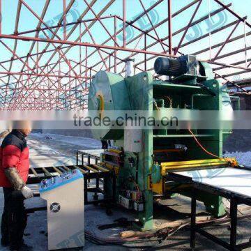 Perforated plasterboard making machine