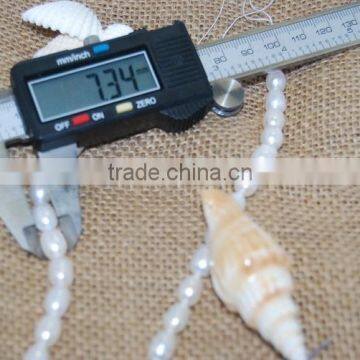 7-10 mm White Rice Shape Freshwater Pearl Strand photo-3