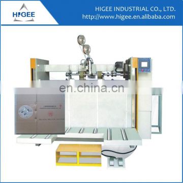 Automatic strapping machine for cartons