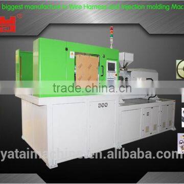 Horizontal injection vertical clamping injection molding machine