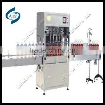 Full automatic 4 pipe edible oil filling machine add capping machine also can add labeling machine