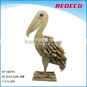 Decorative large wooden pelican statue