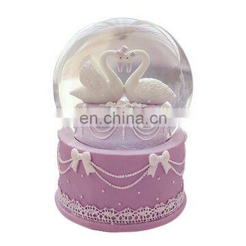 Fantasy pink swan snow globe for decoration