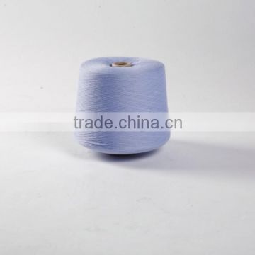 Colored ring spun polyester yarn