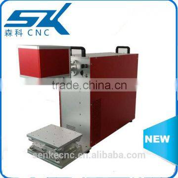 10w fiber tabletop laser engraving machine with Ezcad software handheld plastic glass cup steel silver pendant ring                        
                                                                                Supplier's Choice