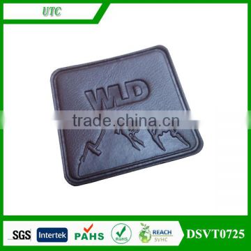 GuangDong custom embossed leather patch with metal badge