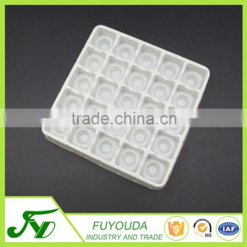 Disposable white plastic blister chocolate box with 25 square holes