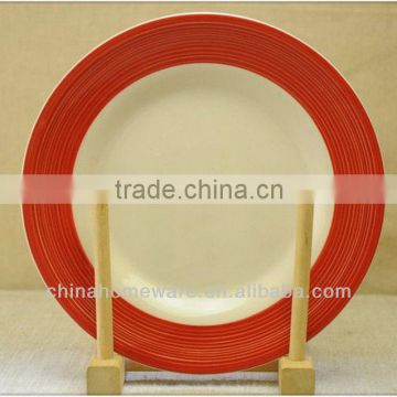 western style plain ceramic plate with a rim decoration