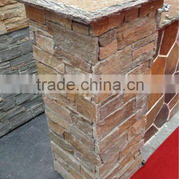 beige natural stone cement pillar in fence