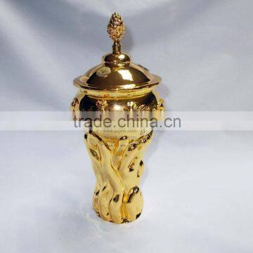 Gold metal cup trophy