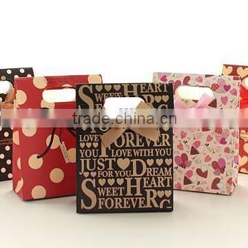 Environmental protection kraft paper shopping bag with patch handle