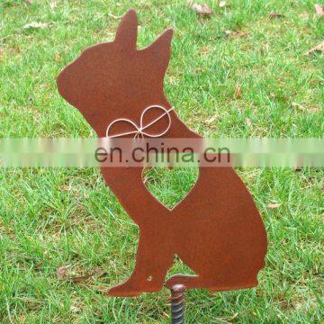 rusty metal Labrador Retriever sitting yard stake