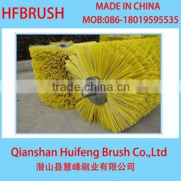 Yellow road sweeper brush