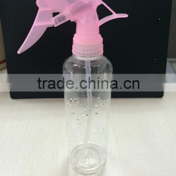 clear colored plastic bottles with pink trigger sprayers