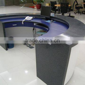 purple and black artificial stone reception counter table