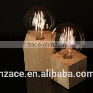 Wooden table lamps with textile cable and extra large vintage Edison bulb