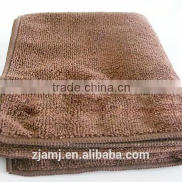 Microfiber absorbent sports towel in weft knitted