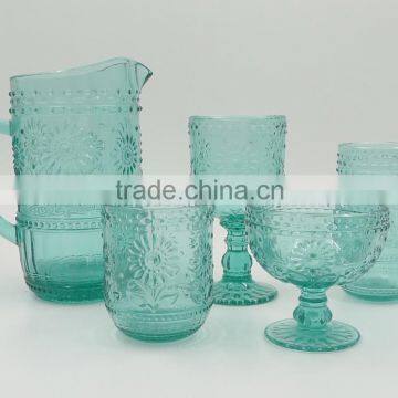 press glass drinkingware/Wine goblet,Hiball,DOF, sundae cup,pitcher in lake blue color with sunflower embossed patern