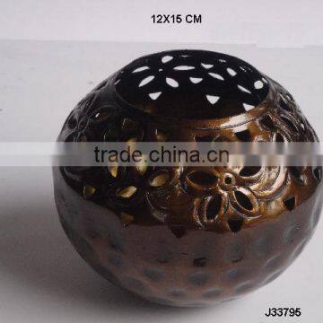 Antique brass finish votive with hand cut patterns made in sheet Aluminium other finishes can be made on request