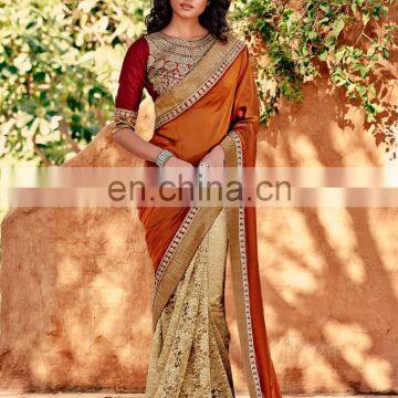 mustard and beige colored silk crepe and net saree.