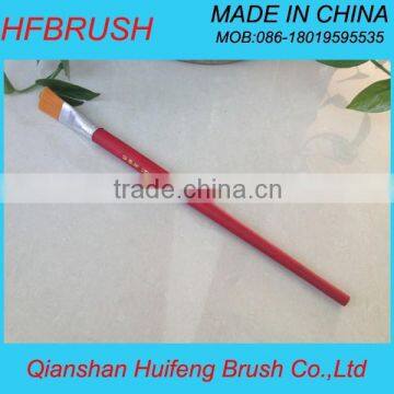 Red handle oil brush